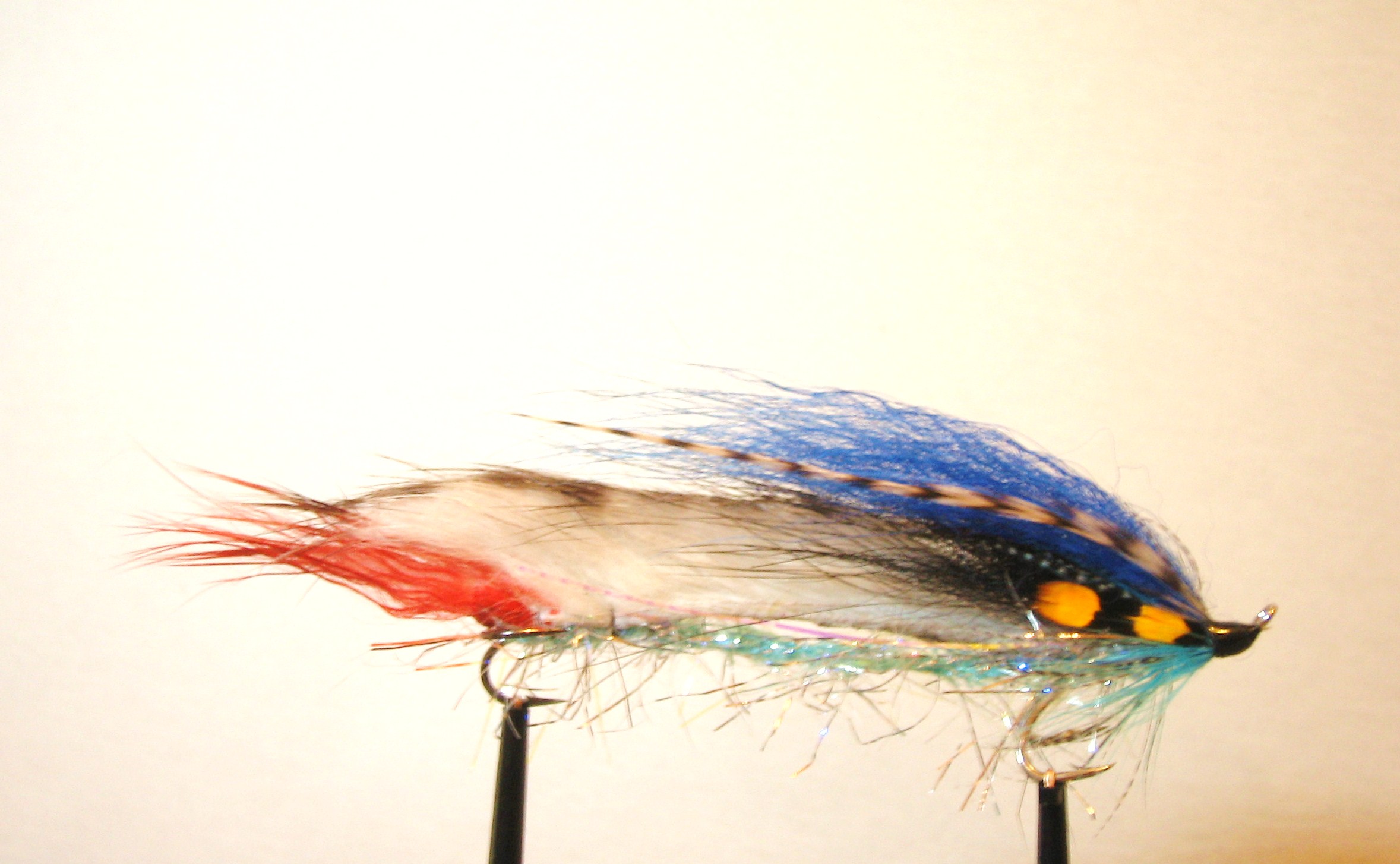 thumbnail image 2 of Troutflies UK Orange Humongous Snake Flies – 4 Pack, Size 10 Rear Hook For Trout & Pike 2 of 4